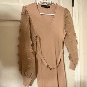 Elegant Beige Knit Dress with Chain Detail